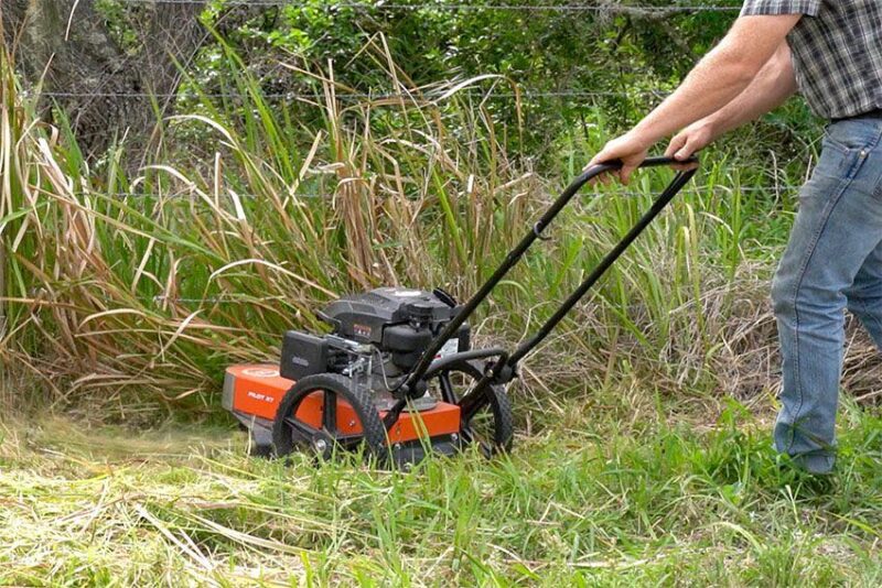 mowing with Pilot XT gas trimmer